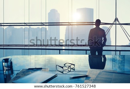 Businessman in a big office