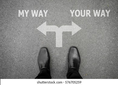 Businessman In Black Shoes Has Decision To Make At The Cross Road Which Way To Go - My Way Or Your Way