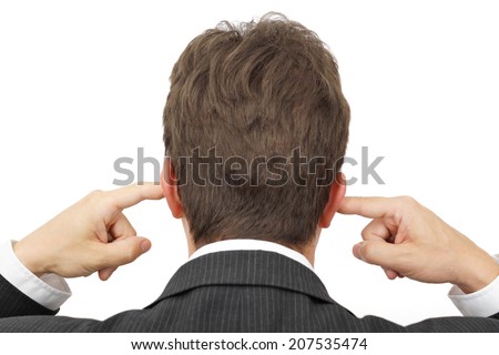 businessman blocking his ears with fingers .  deaf manager concept Stock photo © 