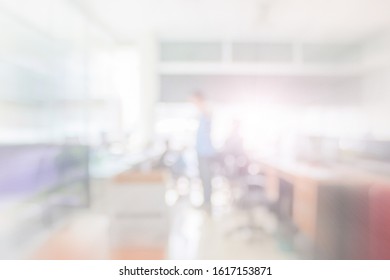 Businessman Blur In The Workplace At Sitting On A Computer Screen Work Space On Table Desk Work In Office Blurry, Document Division And People Shallow Depth Of Focus Horizontal Abstract Interior.