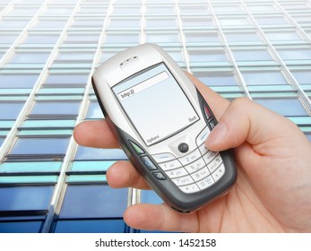 Businessman browsing internet using advanced mobile phone