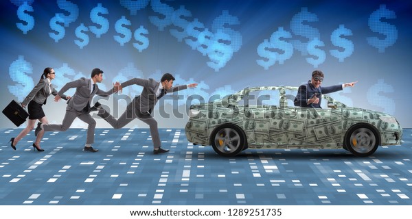 Businessman in\
the business concept with dollar\
car