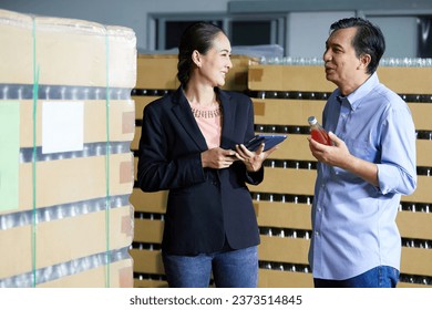 businessman and businesswoman checking basil seed drink or product in the beverage factory - Powered by Shutterstock