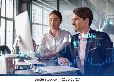 Businessman and businesswoman in formal wear working together to optimize trading strategy at corporate finance fund. Forex chart hologram over office background with panoramic windows - Shutterstock ID 2151453727