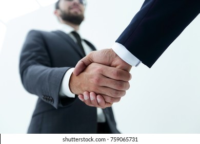 Businessman By Handshake Invites To Cooperation.