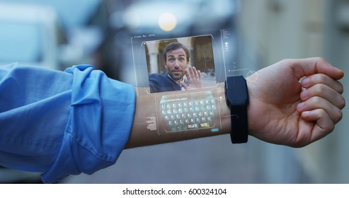 A businessman call a friend and colleague elegant dress that appears in hologram clock futuristic and technological. Concept: network, conference, technology, augmented reality and future, friendship