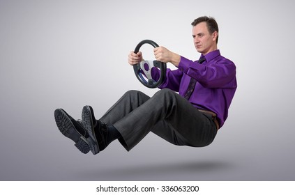 Businessman Car Driver With A Steering Wheel