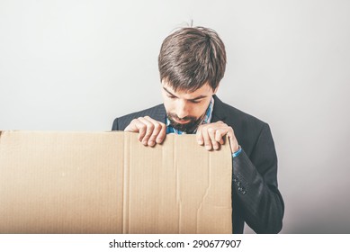 businessman with cardboard Inscription - Shutterstock ID 290677907