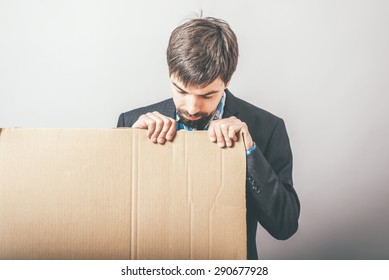 businessman with cardboard Inscription - Shutterstock ID 290677928