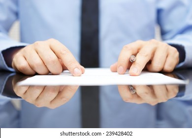 Businessman Is Carefully Reading Contract