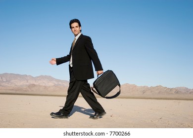 Businessman carrying his laptop case - Shutterstock ID 7700266