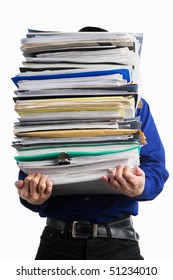 A Businessman Carrying Pile Of Paperwork, Over White Background