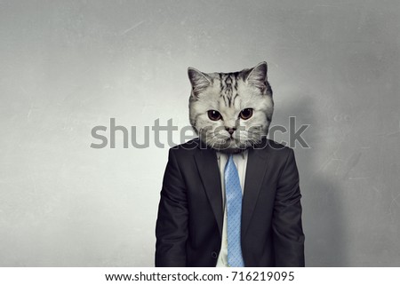Businessman with cat head . Mixed media