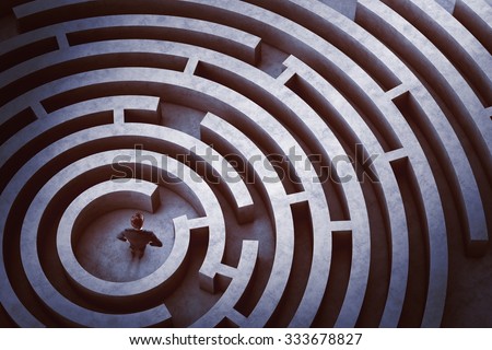 Businessman at the center of a maze