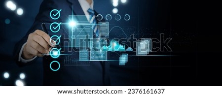 Businessman check electronic documents on digital business approvals and online checklists, Communication technology , Efficient online evaluation digital documents of business on virtual interface.