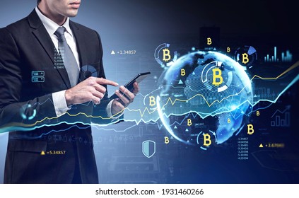 Businessman checking cryptocurrency, bitcoin stock market rate in smartphone. Hologram globe and charts. Business and financial success concept. double exposure. - Powered by Shutterstock - Get 15% off with code: PIKWIZARD15