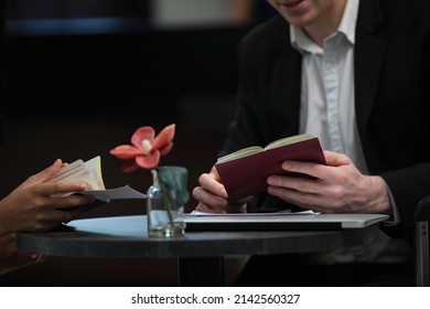 Businessman Checking A Travelling Passport. Passengers In Lounge  International Airports. Exclusive Room