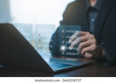 Businessman checking virtual task checklist on laptop using stylus. Digital approval interface with checkmark symbols, representing task validation, rejection, and verification process.