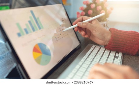 Businessman checking work on tablet