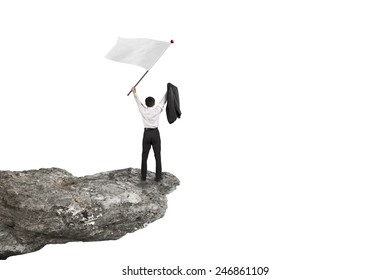 A Businessman Cheering On Cliff Waving Blank Flag With White Background