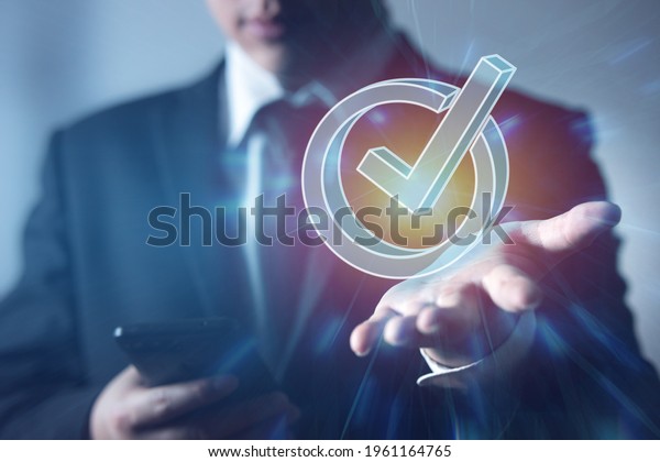 businessman-choose-options-check-mark-meaning-stock-photo-1961164765-shutterstock