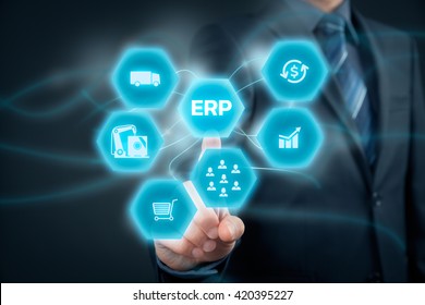 Businessman Click On ERP Business Management Software Button For Collect, Store, Manage And Interpret Business Data Like Customers, HR, Production, Logistics, Financials And Marketing.
