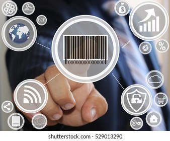 The businessman clicks barcode product network icon on the touch screen.