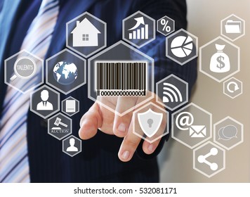 The businessman clicks barcode product network icon on the touch screen the web network .