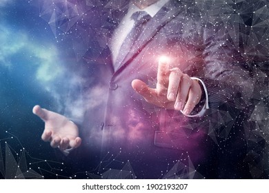 Businessman clicks in network connections on the background of outer space.