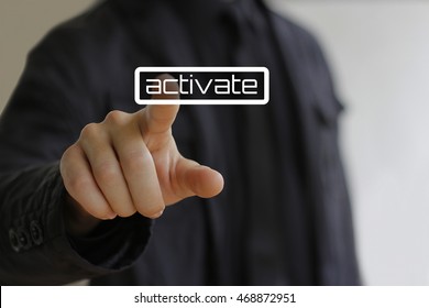 Businessman clicks on the activate button