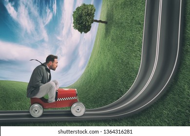 Businessman Climb An Uphill Road With A Small Car. Difficult Carrer Concept