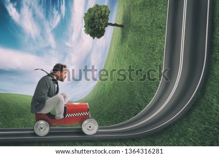 Businessman climb an uphill road with a small car. Difficult carrer concept