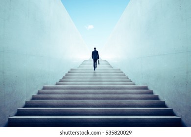 Businessman climbing stairs ,Ambitions concept . - Shutterstock ID 535820029