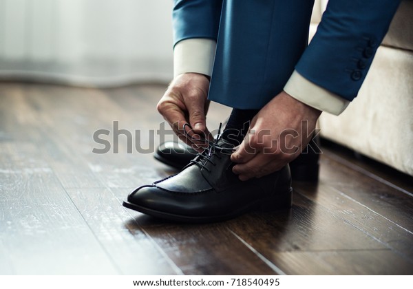 businessman clothes shoes, man getting\
ready for work,groom morning before wedding\
ceremony