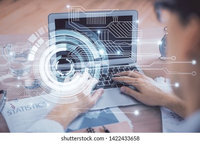 Businessman with computer background with technology theme hologram. Concept of big data. Double exposure.