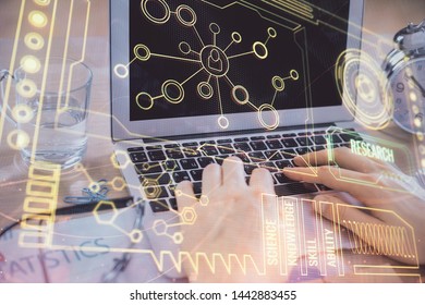 Businessman with computer background with technology theme hologram. Concept of big data. Double exposure.