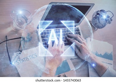 Businessman with computer background with technology theme hologram. Concept of big data. Double exposure.