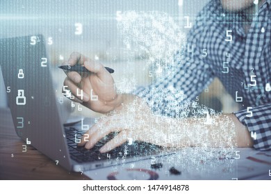 Businessman with computer background with technology theme hologram. Concept of hightech. Multi exposure.