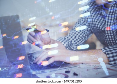 Businessman with computer background with technology theme hologram. Concept of hightech. Multi exposure.