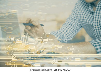 Businessman with computer background with technology theme hologram. Concept of hightech. Multi exposure.