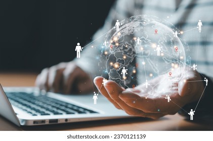 Businessman control global online marketplace and reach for customer engagement with insight data analytic, business intelligence. SEO marketing big data strategy for worldwide omnichannel market.