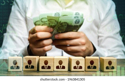 Businessman counting euro money over employee figures. Calculation of the company's profit. Payment personnel work, cost optimization. Accounting and budgeting. Payday. Investments and lending. - Shutterstock ID 1963841305