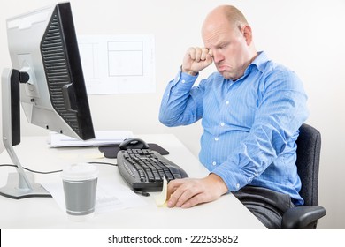 Businessman crying and whining at the office