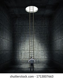Businessman in a dark concrete room with a ladder to the  hole . Finding solution in tough times . Way out of problems, career opportunity.