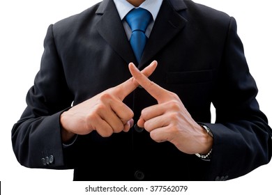 Businessman in dark gray suit using his hands as cross. Meaning wrong, fault, not correct, not allow, prohibit. - Shutterstock ID 377562079