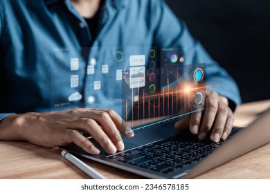 Businessman deploys AI for data analytics. AI generates insights. Futuristic tech, online robots. Future business, invest, innovate, thrive concept. - Shutterstock ID 2346578185