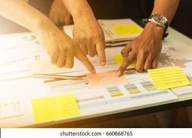 Businessman Develop Plan And Make Strategy For Invest In Global Market ; Business Teamwork Review And Analyse Information Report Of Economic Investment At Office