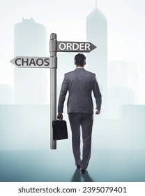 Businessman in difficult choice concept - Shutterstock ID 2395079401