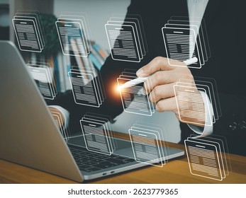 Businessman digital document management on laptop with holographic interface. Sorting or managing files. Organizing digital organization data storage documents in online database.