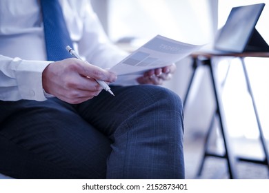 Businessman doing finances and calculate about cost, Business Financing Accounting Banking Concept - Shutterstock ID 2152873401